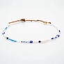 Lotus and Luna Evil Eye Necklaces,